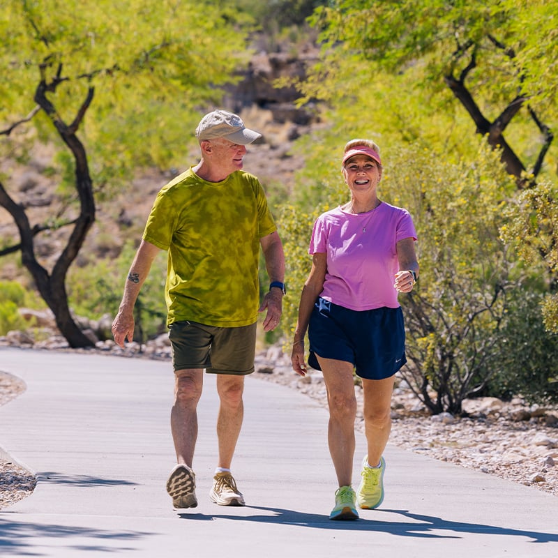 seniors walking on a walking trail