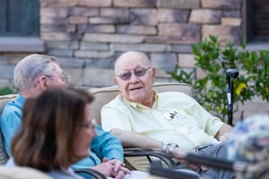 seniors sitting on outdoor patio