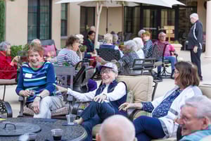 seniors sitting on outdoor patio