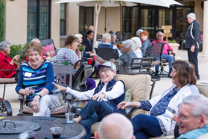 seniors sitting on outdoor patio