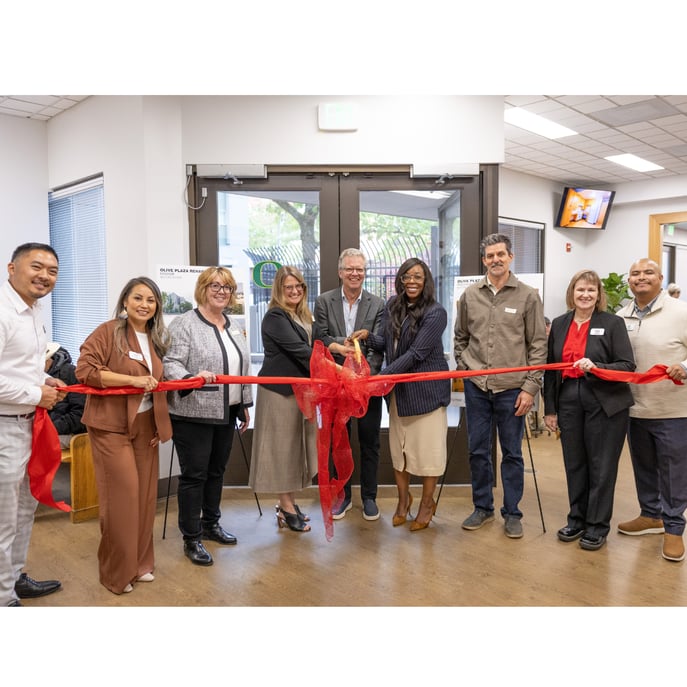 Ribbon cutting at Olive Plaza