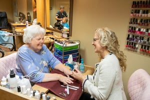 senior at nail salon