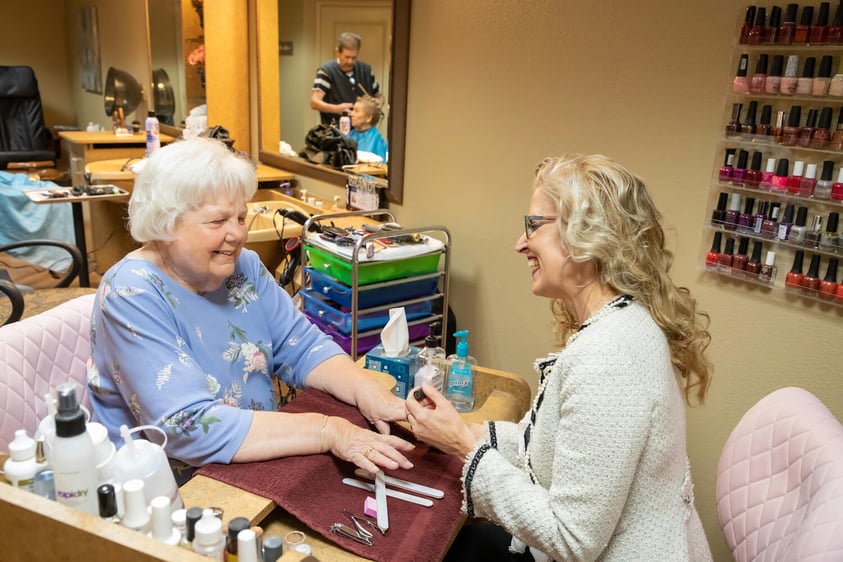senior at nail salon