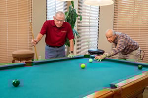 seniors playing pool